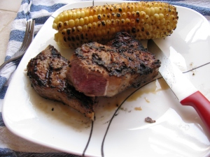 Hellfire strip steak with grilled corn on the cob