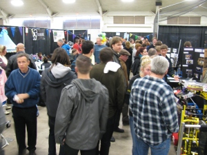 Despite the rain, there was a constant crush of people in, near and around the Not Your Grandpa's Ham Radio booth at the 2013 San Diego Mini Maker Faire