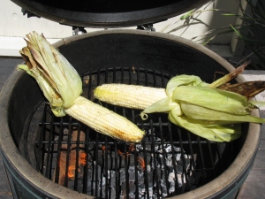 Peel the husks down if you want, and roast the kernels directly. This will add some nice grill marks to your corn